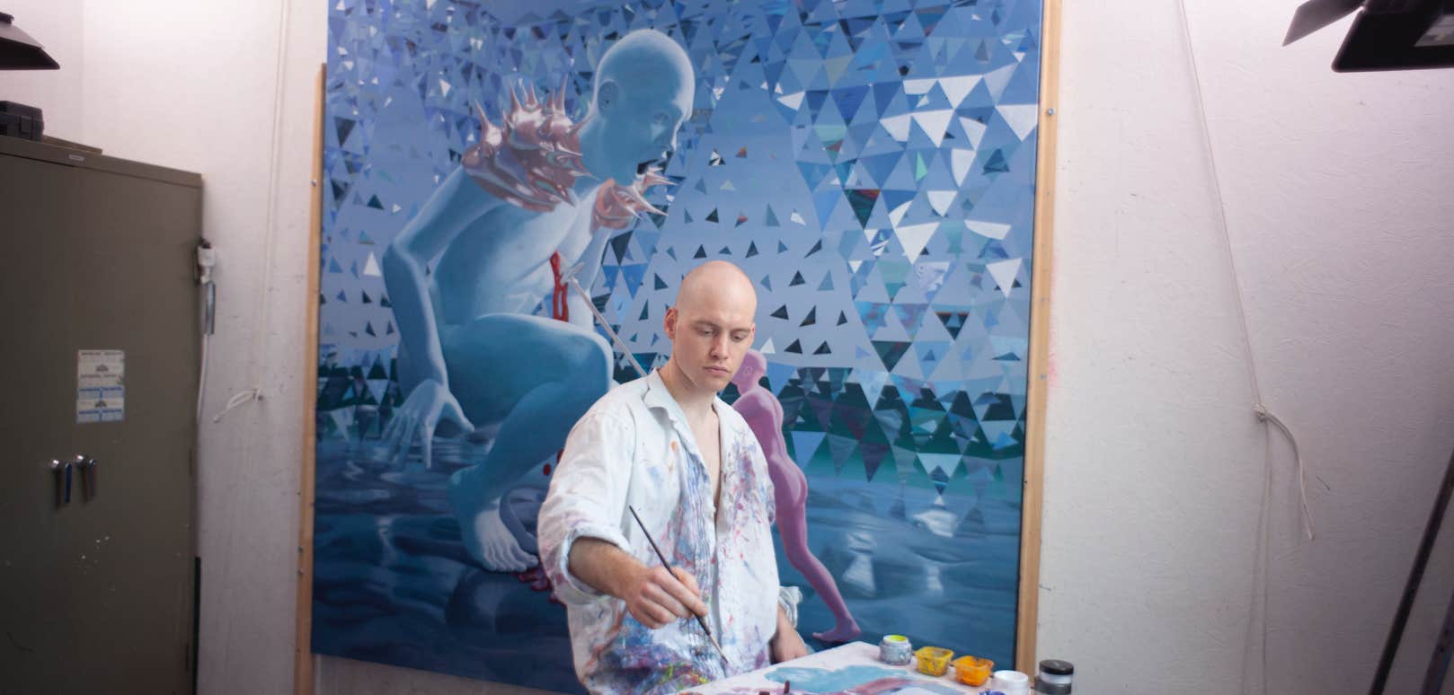 Painter Seppe De Roo in his atelier while painting 'Leviathan' 